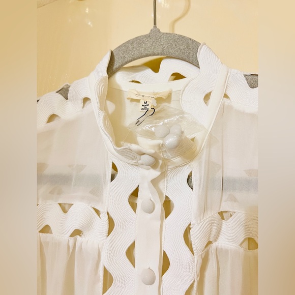 THE SANG stark White Jumpsuit. Size MEDIUM. NWOT. Xtra buttons Attached. - Picture 8 of 13